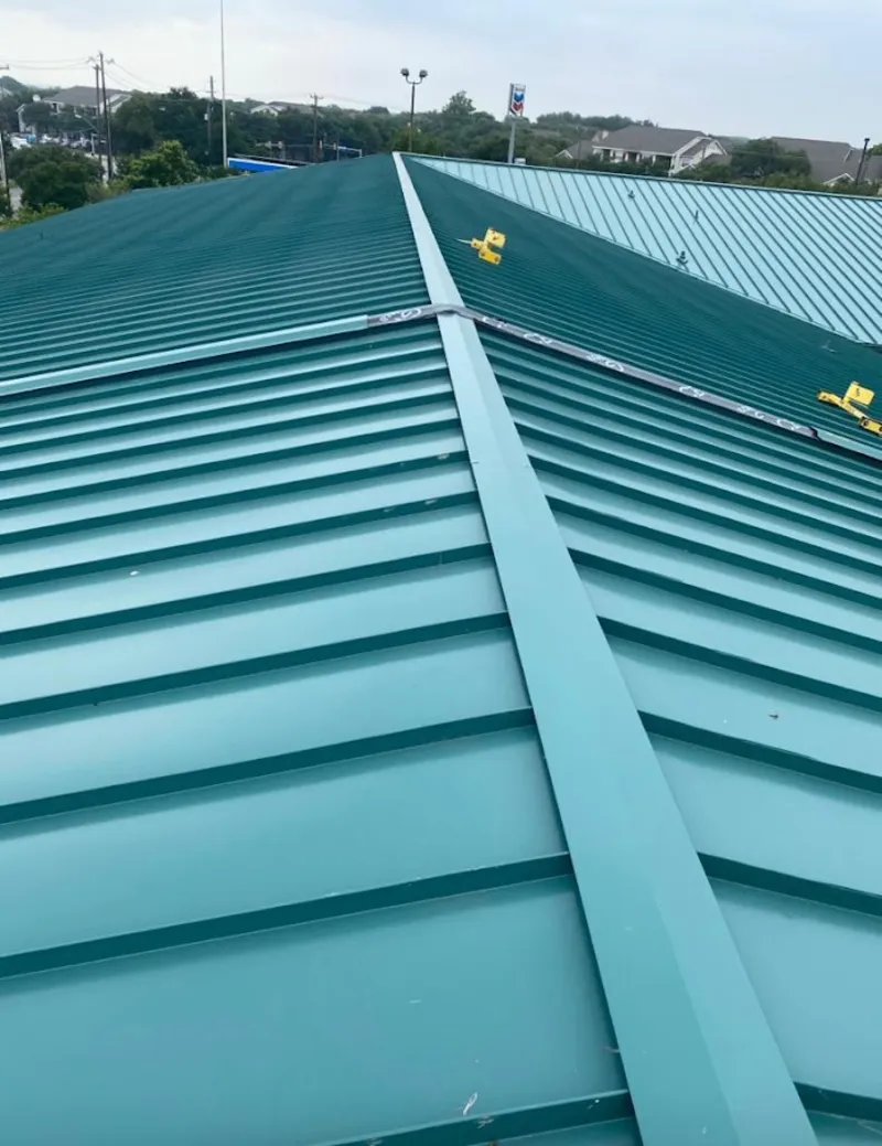 Green commercial metal roof ridge and valley for Metal Roof Repair in Alpine